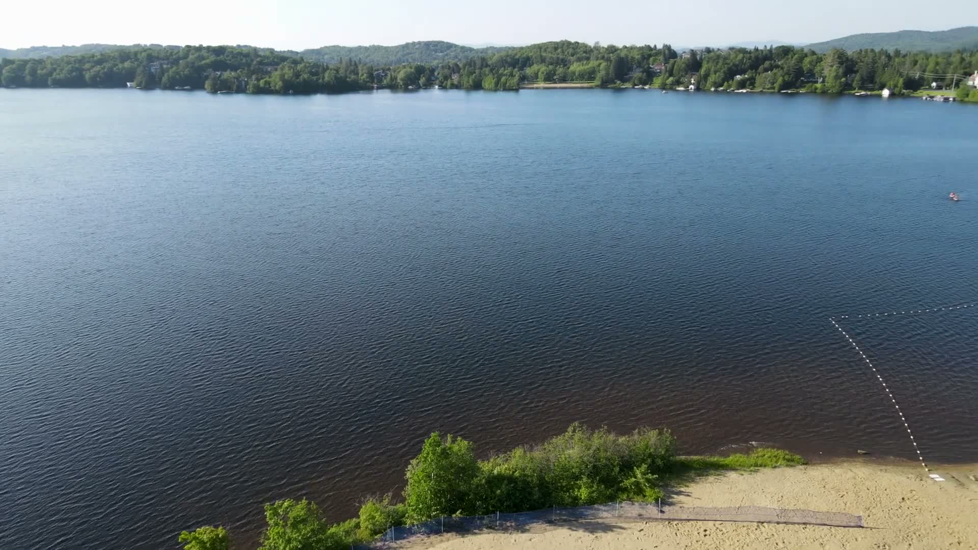 Aerial view of Lac des Sables and the beach in summer in Sainte-Agathe-des-Monts